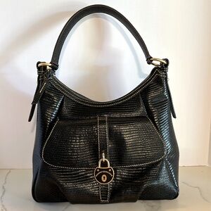 Dooney & Bourke black pebbles leather hobo bag with logo lock. Preowned.